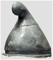 A metal Phrygian Helm. C4th BC (HERMANN HISTORICA MUNICH AUCTION HOUSE)